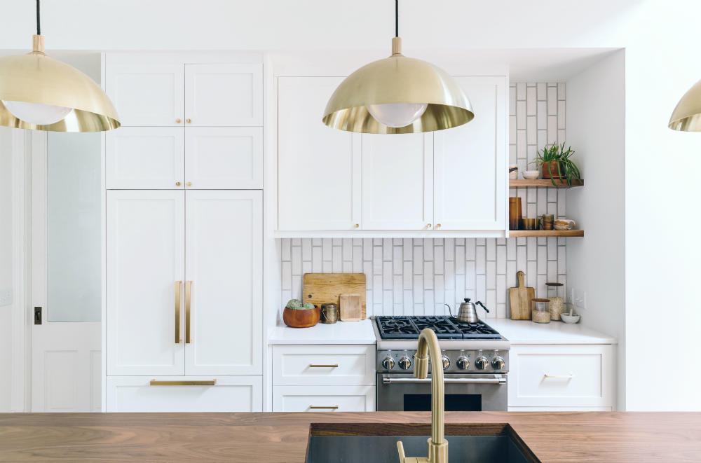 gold-light-fixtures-white-kitchen